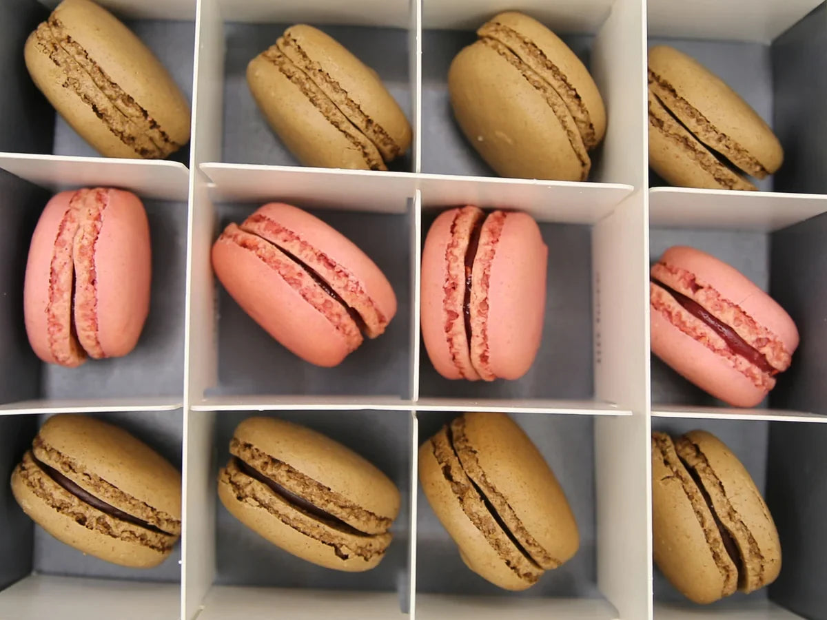 Assorted chocolate and raspberry macarons in a gift box – dessert canapé delivery London