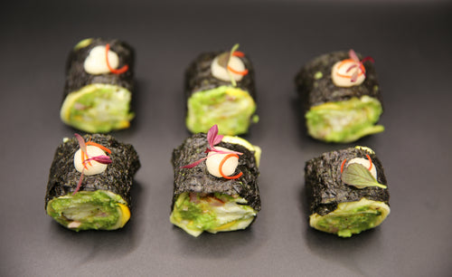 Six Atlantic cod canapé rolls with pea purée and courgette – canapé delivery London