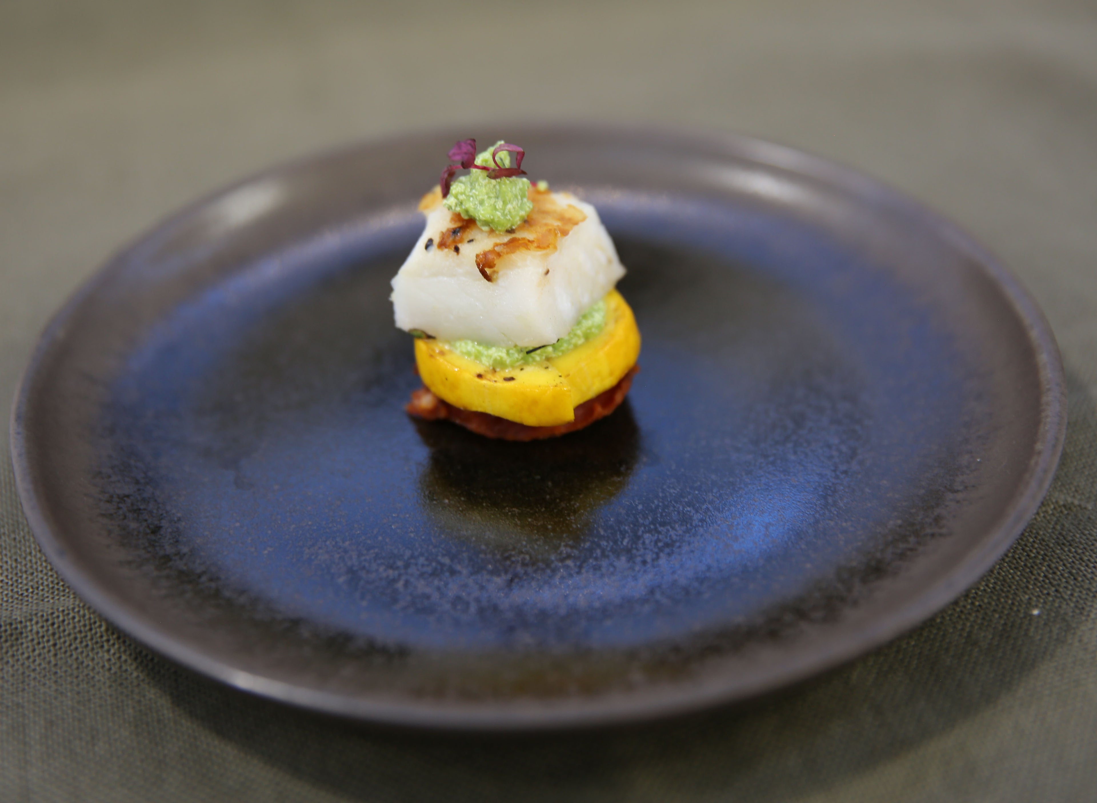 Atlantic Cod with Crispy Chorizo, Pea Purée, and Delicately Grilled Courgette