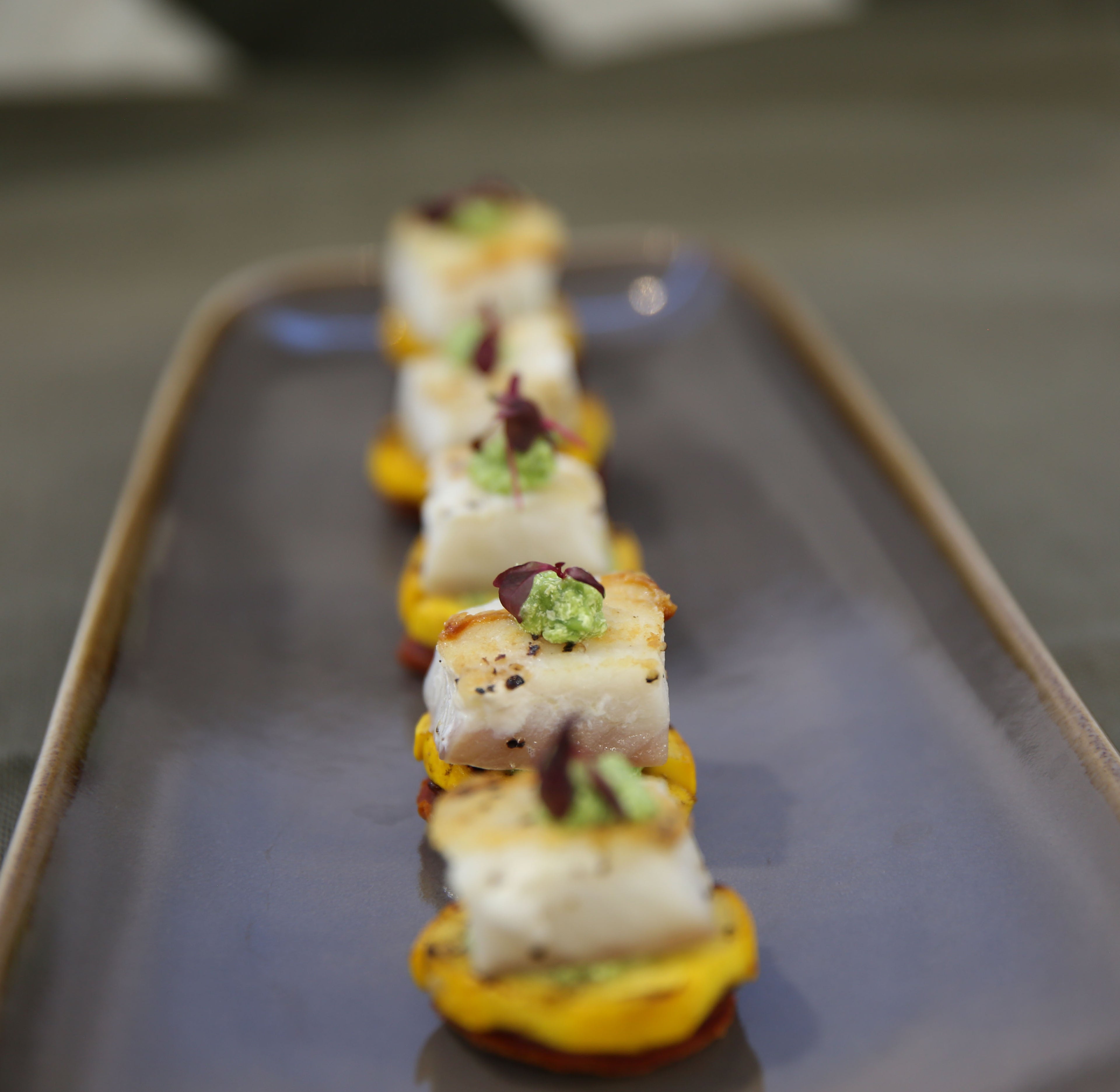 Atlantic Cod with Crispy Chorizo, Pea Purée, and Delicately Grilled Courgette
